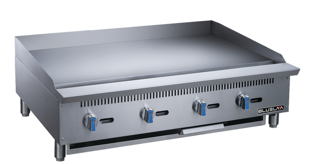 A large stainless steel heavy duty gas griddle with four blue-handled manual control knobs, a flat cooking surface, raised back and sides, vent slits, and short legs. The “BLUEVAN” logo appears on the lower right front panel.
