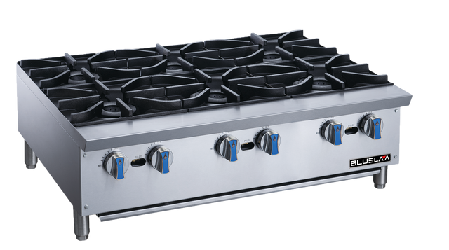 A stainless steel commercial gas stove with six large black cast-iron burners, six blue and black control knobs, and sturdy metal legs. This durable countertop unit features the brand name BLUELAVA on the right side of the front panel.