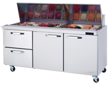 The Blue Air mega top sandwich prep table features casters, two drawers, two doors, and a top compartment for salad fixings like greens, tomatoes, and meats under a raised glass lid. A digital display shows the temperature for optimal freshness.