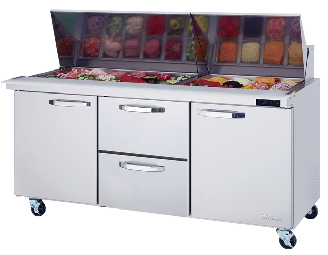 A commercial stainless steel sandwich prep table on wheels features a mega top glass section displaying chopped vegetables, with three closed compartments below: two side doors and a pull-out center drawer, perfect for efficient commercial refrigeration.