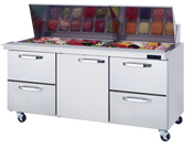 The Blue Air FSE Mega Top Sandwich Prep Table features a stainless steel build with a glass-covered display for ingredients, six drawers, and four wheels—perfect for organizing meats and veggies in any busy kitchen.