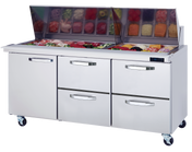 A freezer with food in it sits beside a refrigerated prep table, perfect for keeping ingredients fresh and organized.