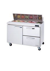 The Blue Air BLPT48-D2R-HC refrigerated prep table features a stainless steel body, one door on the left, two drawers on the right, and a raised section on top holding sliced vegetables in clear containers. The unit is mounted on four wheels.