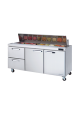 A commercial Sandwich Prep Table with a stainless steel build features three drawers and a glass-covered, three-section top displaying colorful veggies and meats in containers. The unit stands on caster wheels, set against a plain white background.