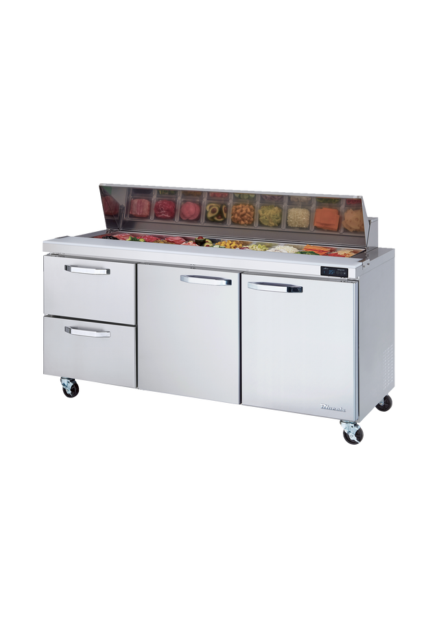A commercial Sandwich Prep Table with a stainless steel build features three drawers and a glass-covered, three-section top displaying colorful veggies and meats in containers. The unit stands on caster wheels, set against a plain white background.