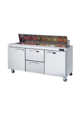 A commercial Blue Air BLPT72-D2M-HC refrigerated prep table with four drawers and compartments. The open lid on top displays containers filled with fresh toppings, making it an ideal sandwich prep table for restaurants or delis.