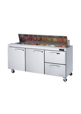 A three-section stainless steel sandwich prep table with two doors and two drawers on wheels, featuring a refrigerated prep table top with an open ingredient station. Various diced vegetables and toppings sit in clear containers beneath a glass sneeze guard.