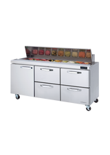 A commercial refrigerated stainless steel sandwich prep table on wheels, featuring four drawers and a top compartment with food containers under a raised glass lid. This three section unit is set against a plain white background.