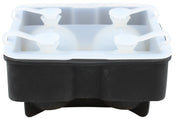 A black and white silicone ice sphere tray with four large round compartments, each sealed with a white cap featuring a looped handle, designed to make spherical ice balls. The tray appears empty and is shown from a slightly low, front-facing angle.