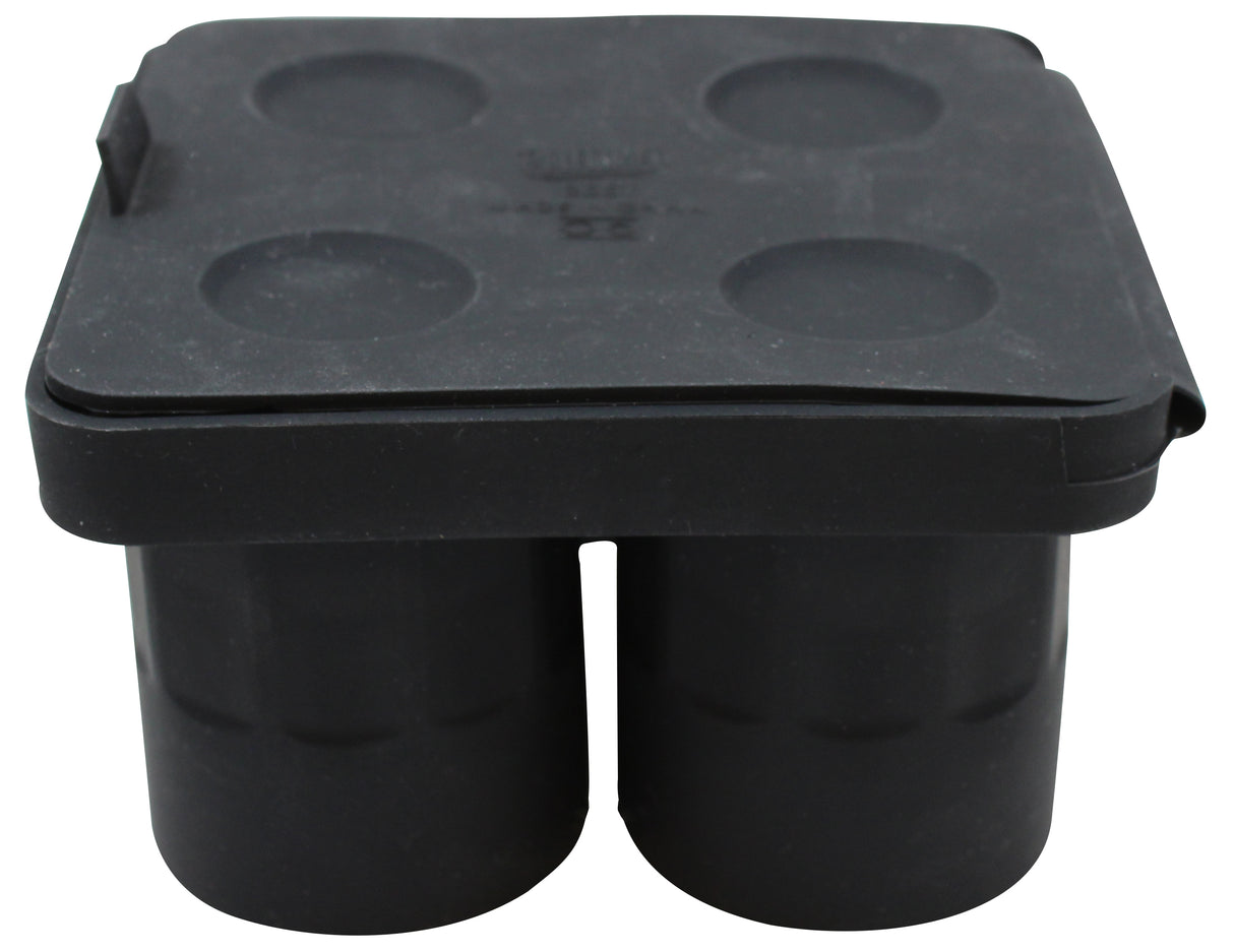 A black, rectangular shot glass ice tray with a lid, designed to make four cylindrical ice cubes. The mold has four round wells visible on top, a slightly raised lid edge, and is made from flexible, durable silicone that’s dishwasher safe.