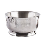 A double wall hammered stainless steel punch bowl with a shiny, textured surface and wide opening sits on a round base. Two small metal ring handles make carrying easy. The background is plain white.