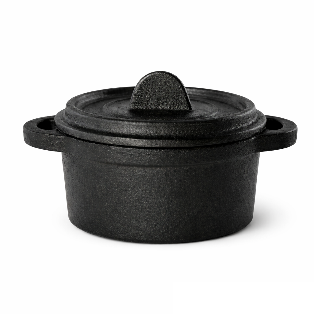 A small, round FortaLite Mini Cassolette with two side handles and a matching lid featuring a central, upright handle. This cast aluminum tableware piece has a textured finish and sits on a plain white background.