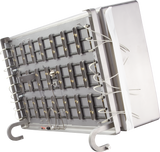 A metallic device resembling an electric braising pan with multiple rectangular black components arranged in a grid, connected by white wires. The structure is tilted, with two curved metal legs and a shiny reflective panel on one side. Background is plain white.