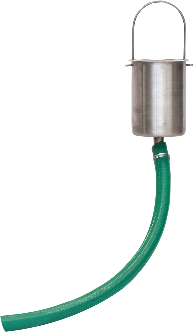 A stainless steel catch can with a bail handle on top is attached to a green flexible drain hose at the bottom. The hose curves downward and to the right against a plain white background.