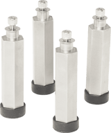 Four tall, hexagonal metal standoffs with black circular rubber bases stand upright, spaced apart like sturdy Berkel leg extensions. Each has a threaded screw on top and casts subtle shadows. The background is transparent.