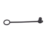 A black TableCraft Sani-Cap Tethered Cap made from thermoplastic polyethylene, featuring a small cap on one end and a circular ring on the other, connected by a flat strap. The cap seals small openings, while the ring attaches to various objects. White background.