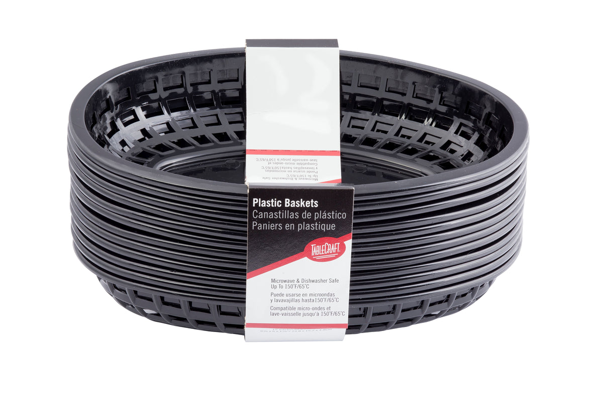 A stack of black, oval-shaped Classic baskets is tightly wrapped with a label in English, Spanish, and French. The open lattice-style sides and dishwasher safe feature make these plastic baskets versatile. The background is white.