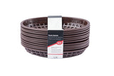 A stack of round, brown plastic baskets with a crisscross pattern. A white and black label in the center reads Plastic Baskets in English, Spanish, and French. These classic baskets are dishwasher safe. The background is plain white.