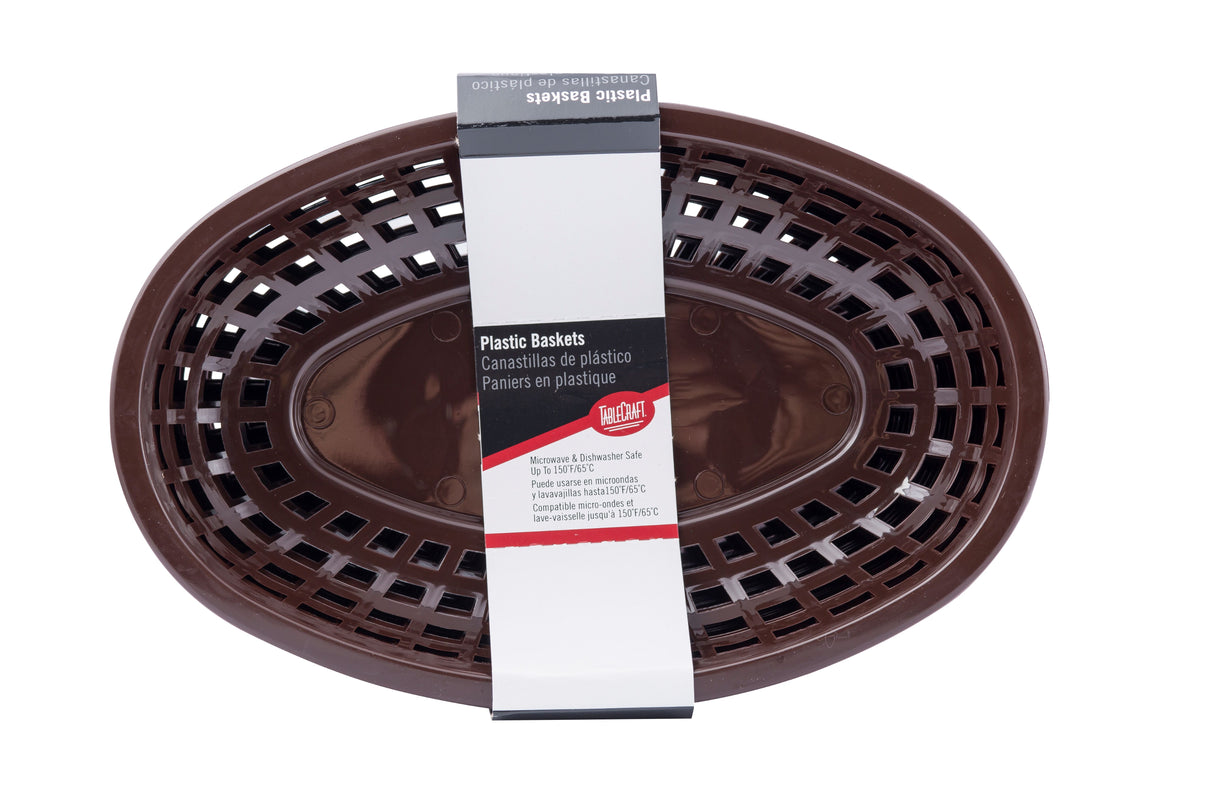 A brown, oval-shaped plastic basket with a grid-like pattern is shown from above. A white and black label wrapped around the basket reads Plastic Baskets in English, Spanish, and French, noting these classic baskets are dishwasher safe. Chef Craft logo included.