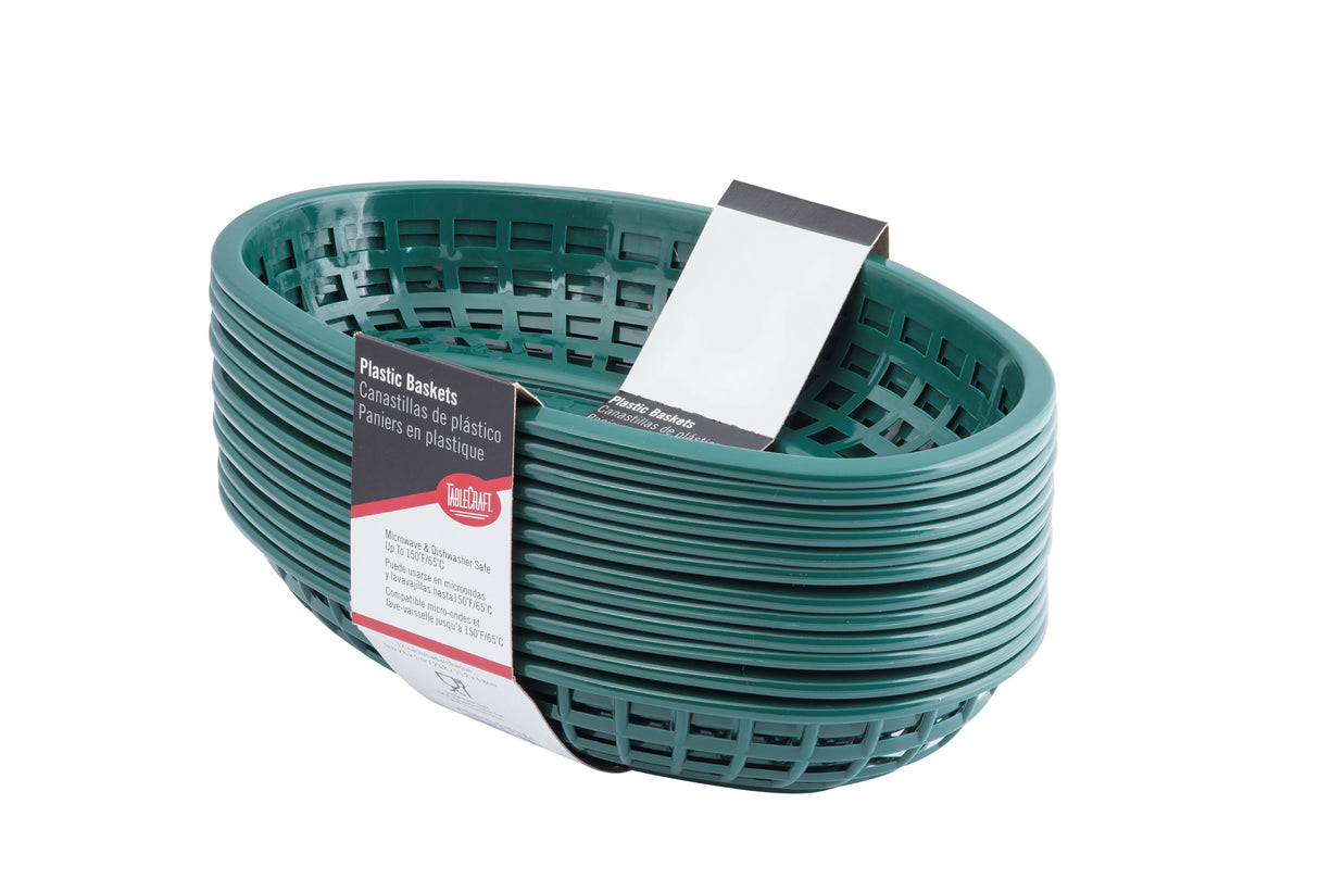 A stack of classic green oval plastic baskets with open grid sides. Made in USA, these baskets have a white paper label in English and French. The stack is shown against a plain white background.