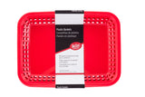 A bright red rectangular plastic basket with vented sides, still wrapped in a white and black label. The label reads “Plastic Baskets” and notes it is a microwave safe, heat resistant basket from the Cash & Carry Grande Baskets line.