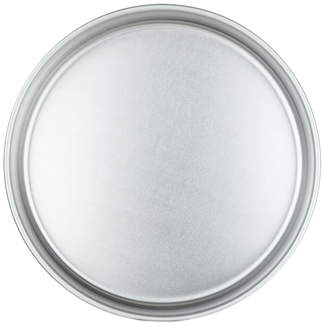 A round, flat, metallic silver aluminum cake pan with a slightly raised rim. The smooth, reflective surface catches light to create soft highlights and shadows. The white background emphasizes the cake pan’s clean, simple design.