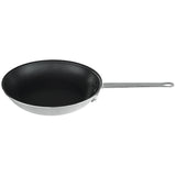 A 10 inch non stick fry pan with a black interior and shiny silver exterior. It features a long, straight silver handle with a hole for hanging. The image displays the pan on a clean white background.