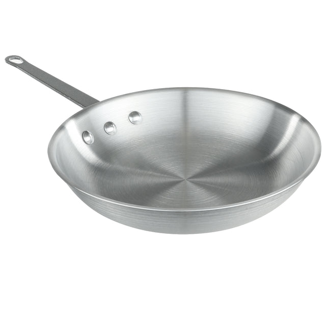 A shiny, silver aluminum fry pan with a brushed finish is shown at an angle. It has sloped sides, three visible rivets attaching a long, flat handle with a hole for hanging. The pan is empty and set against a plain white background.