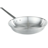 A shiny, metal 14 inch fry pan with a flat bottom and gently sloped sides is shown. It has a long, straight handle attached by three rivets and a hole at the end for hanging. The pan is empty and photographed on a white background.