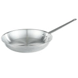 A 14 inch fry pan with a wide, shallow base and curved sides is shown against a white background. This aluminum fry pan features a long, straight handle with a hole for hanging and two rivets securing it to the pan.