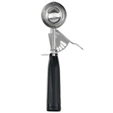 A stainless steel 1 oz disher with a black handle and thumb press trigger-style mechanism, shown upright against a white background. The scoop’s lever system is designed to release ice cream smoothly.