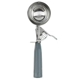 A metal disher with a shiny, round bowl and a gray handle. The handle has a spring-loaded thumb press for easy release, connected to a metal gear below the bowl. The scoop stands upright on a white background.