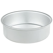 A plain, round, silver-colored aluminum cake pan with straight sides and a flat bottom, shown empty against a white background. Chef Approved and easy to clean, its designed for baking cakes or similar desserts.