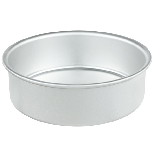 A plain, round, silver-colored aluminum cake pan with straight sides and a flat bottom, shown empty against a white background. Chef Approved and easy to clean, its designed for baking cakes or similar desserts.