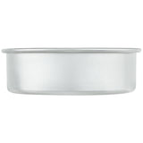 A round, shallow cake pan made of silver-colored aluminum with smooth sides and a slightly flared rim, viewed from the side against a white background. This Chef Approved baking pan features a simple, unadorned design.