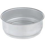 A round, shallow, aluminum dough proofing pan with smooth sides and a slightly indented concentric ring pattern on the bottom. Stackable and simple, it features a shiny finish with no handles or markings, set against a plain white background.