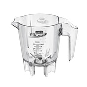 A clear plastic Waring Ellipse jar with a large handle and pouring spout; 32 oz measurement markings in ounces are printed on the side. Metal blades are fixed at the bottom inside, and the base has gear notches for attaching to a blender.