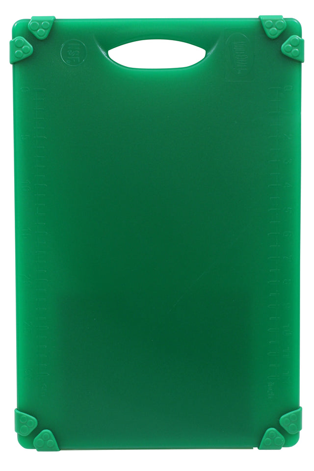 A green, grippy cutting board with rounded corners and a handle slot at the top. The non-slip grips keep it steady, while measurement markings aid precise cutting. Its clean surface is dishwasher safe for easy care.