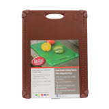 A packaged TableCraft grippy cutting board with brown edges, ruler markings, a top handle, and a front label showing color-coded boards with peppers. The label highlights features like integrated grips and non-slip corners.
