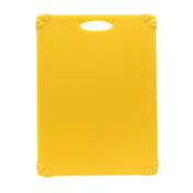 A bright yellow rectangular grippy cutting board with a built-in handle hole at the top. Each corner features a small, heart-shaped grip for stability. Measurement markings are faintly visible along the left and right edges. Dishwasher safe cutting board.