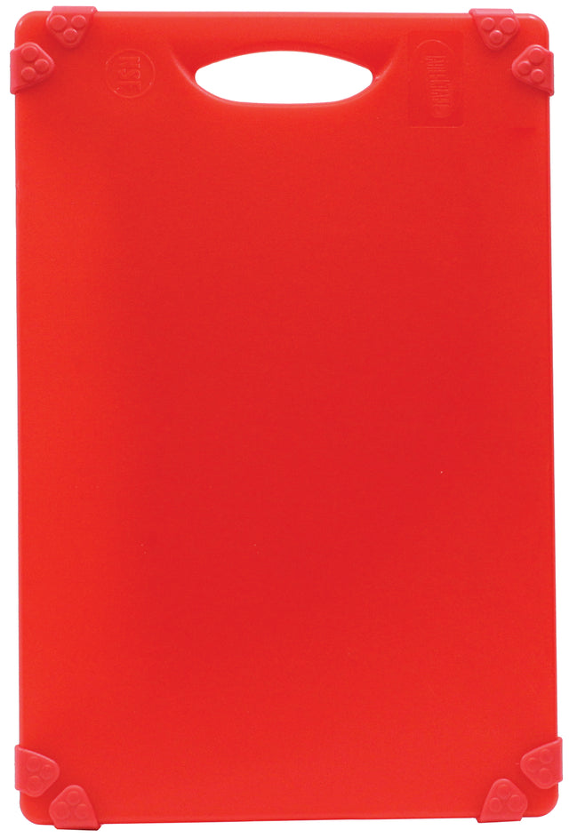 A rectangular, bright red dishwasher safe cutting board with rounded corners, a built-in handle cutout at the top, and non-slip rubber grips at each corner. The surface is smooth and plain, with no visible textures or patterns.