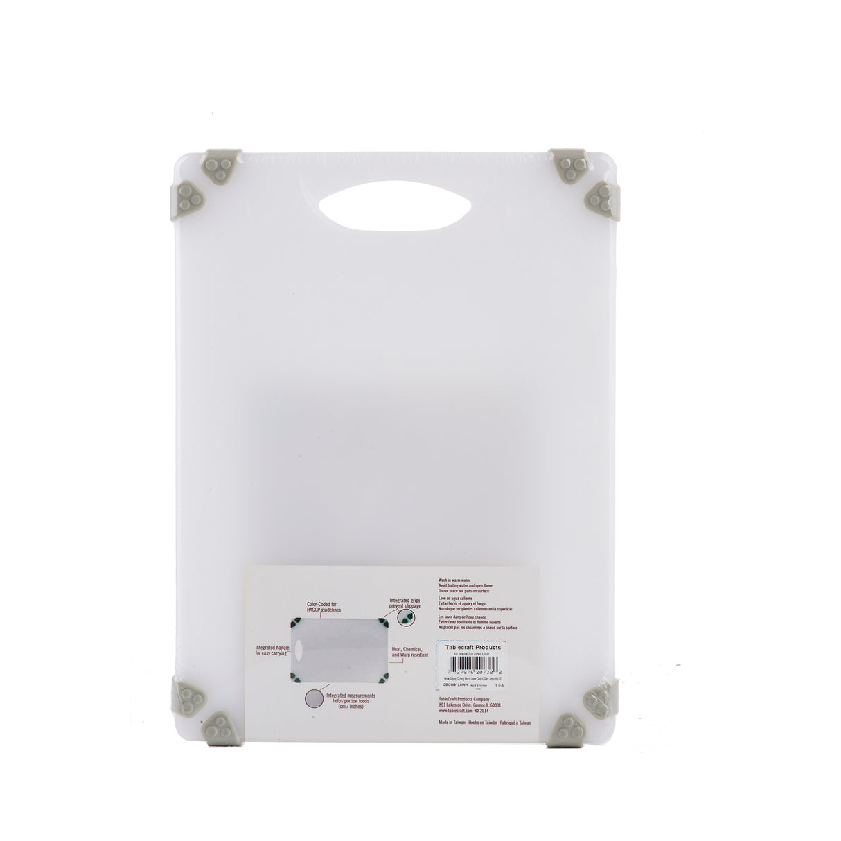 A white plastic Grippy Cutting Board with a built-in handle at the top and gray non-slip corner grips. An attached product label featuring images and text is visible near the bottom center. The background is plain white.