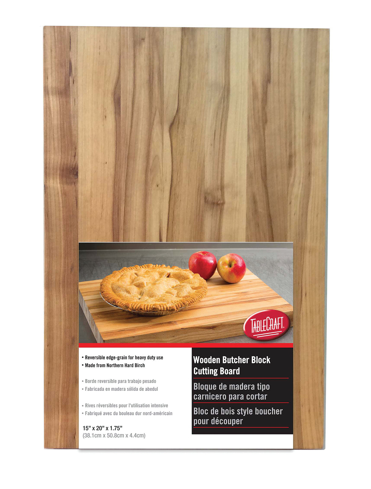 A rectangular edge-grain butcher cutting board with a natural wood finish. A label shows a baked pie and two apples on the board, describing it as reversible, heavy-duty, and made from northern hard birch wood.