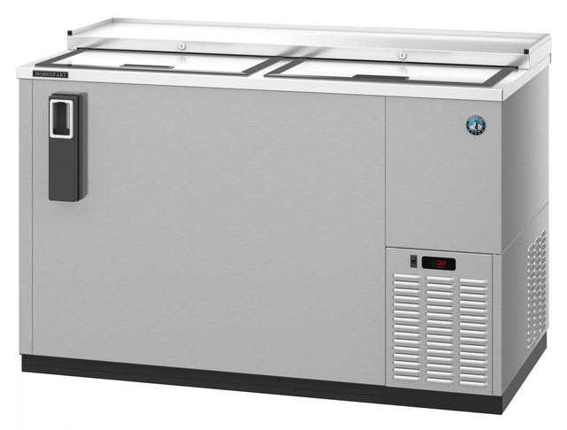 The Hoshizaki CC50-S is a stainless steel refrigerated bottle cooler featuring sliding lid doors, left-side handle, digital temperature display, and front ventilation grilles. Its clean, modern design is perfect for bars or restaurants.