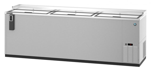 A large, stainless steel three-section commercial freezer with three sliding lids on top, a black handle on the left, ventilation grilles and a digital temperature display on the right, set against a plain white background. Ideal as a refrigerated bottle cooler.