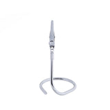 A shiny stainless steel binder clip stands upright, its arms extended downward and twisted into a circular loop, resembling a minimalist number card holder against a plain white background. The image highlights the unusual stand-like position of the clip.