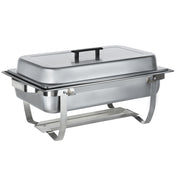 A full size stainless steel chafing dish with a fitted lid and black handle, designed for buffet use. The dish stands on a sturdy folding frame with curved legs and includes a lower shelf for fuel to keep food warm.