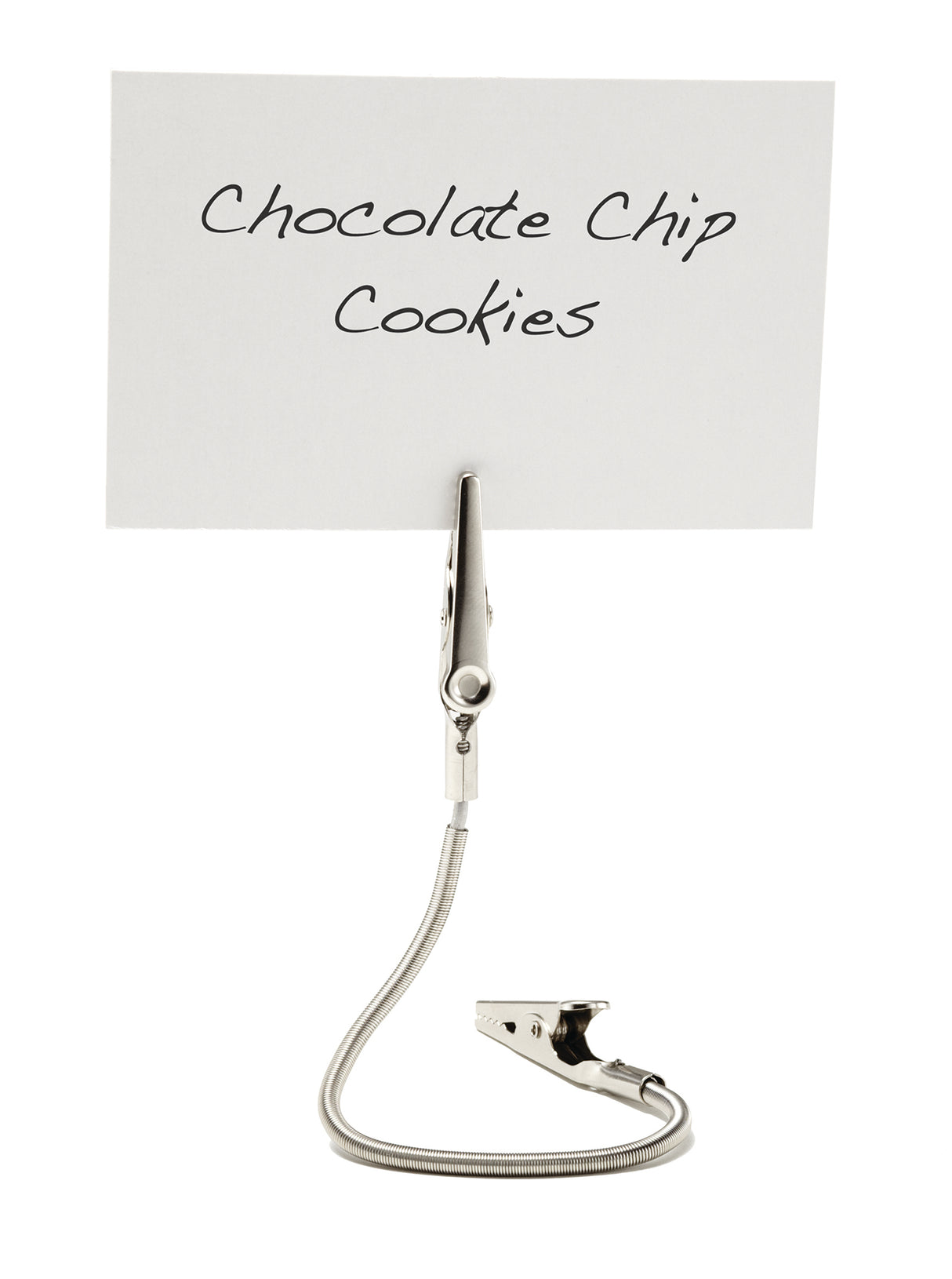 A white card with “Chocolate Chip Cookies” handwritten in black sits clipped upright by a steel double sided Number/Card Holder featuring a flexible, coiled stem, against a plain white background.