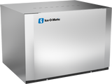 A large, stainless steel commercial ice maker with a smooth, reflective surface. The front features the blue and white Ice-O-Matic logo near the top left corner. Its sleek, boxy design is typical of a premium modular cube ice maker.