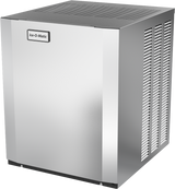 A stainless steel, box-shaped Ice-O-Matic modular cube ice maker with a vented side panel and a black label on the front. This air-cooled unit has a smooth, modern finish, sits on small black feet, and produces half-size cubes with top airflow vents.